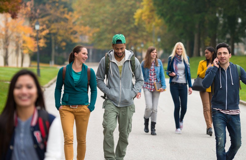 Group of College Students Walking on Campus