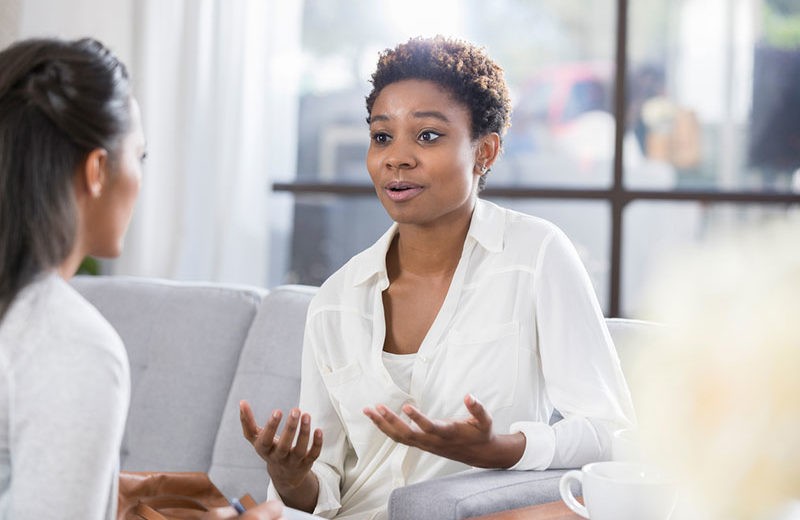 Two Women Having a Conversation